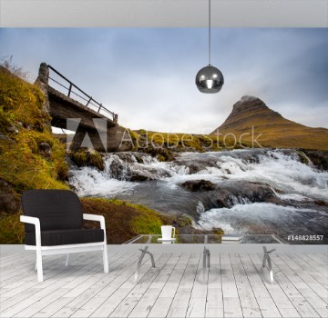 Picture of Cold water in Iceland Waterfall in rocky mountains Fresh and green grass Beautiful mountain range in the backgrond
